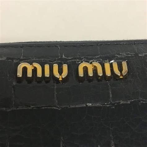 miu miu logo wallet on chain|Miu Miu Croc.